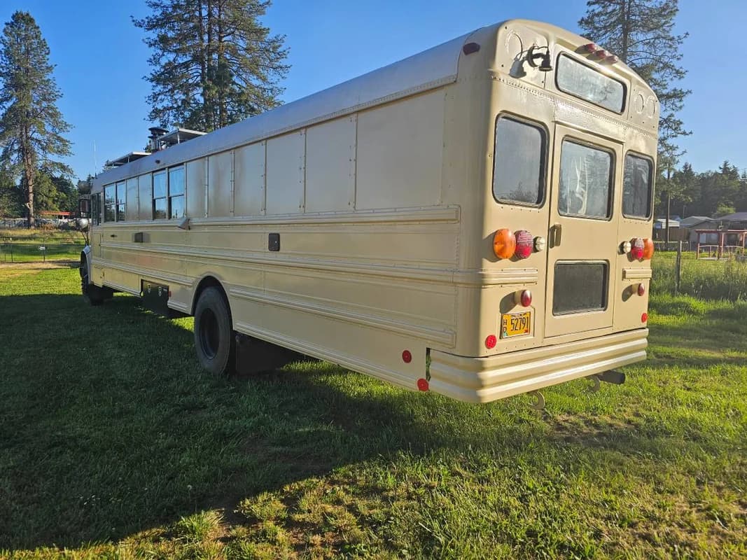 Fully Off-Grid Skoolie Tiny Home on Wheels – Luxury Conversion Bus 11