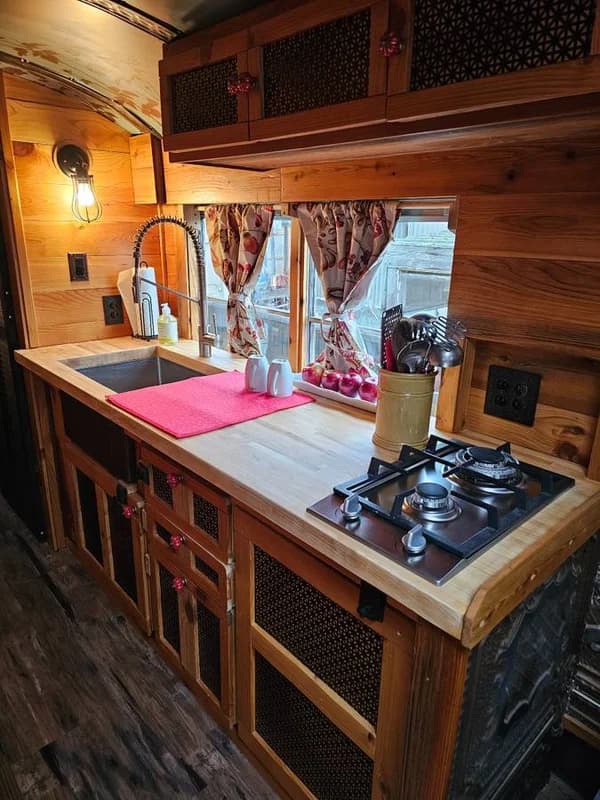 Fully Off-Grid Skoolie Tiny Home on Wheels – Luxury Conversion Bus 19